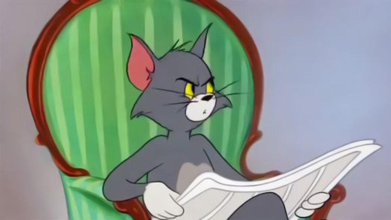Figure 1: Tom the cat sitting on a chair, looking suspicious while holding a newspaper—just like investors reading a 10-K report